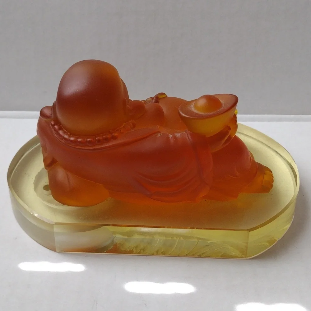 Orange Buddha Figurine